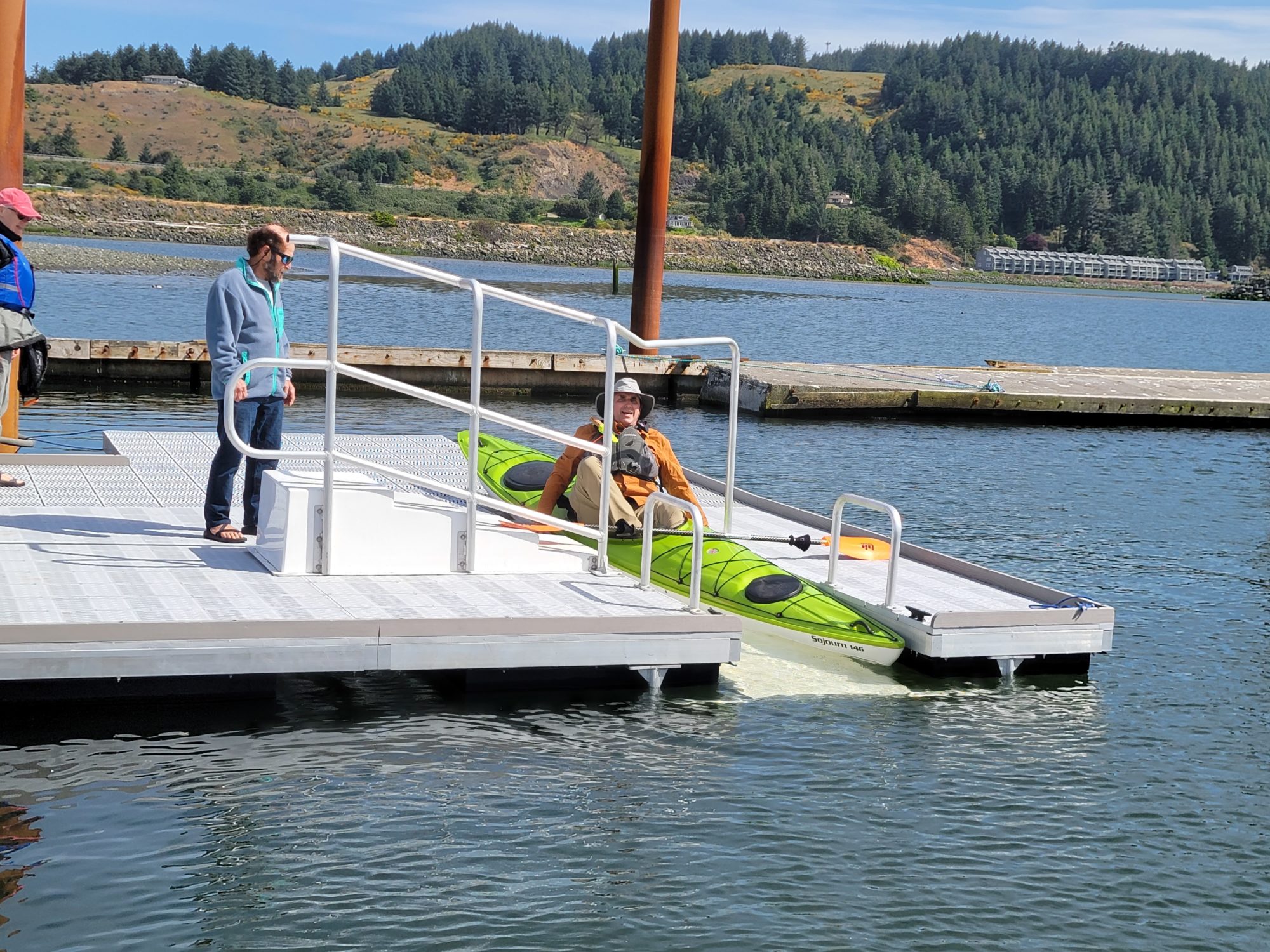 Picture of a kayaker using a kayak launch