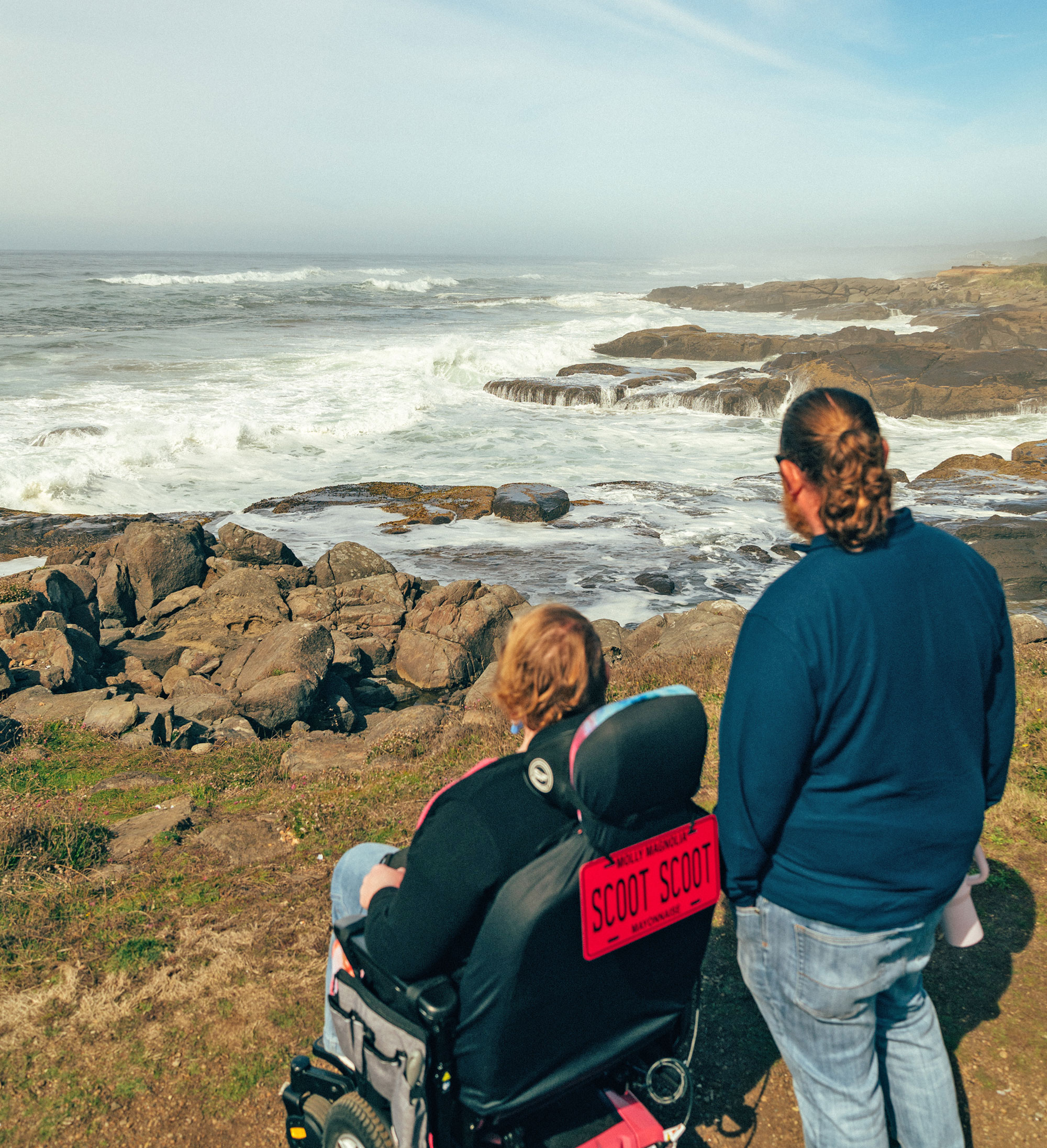 rocky ocean couple wheelchair