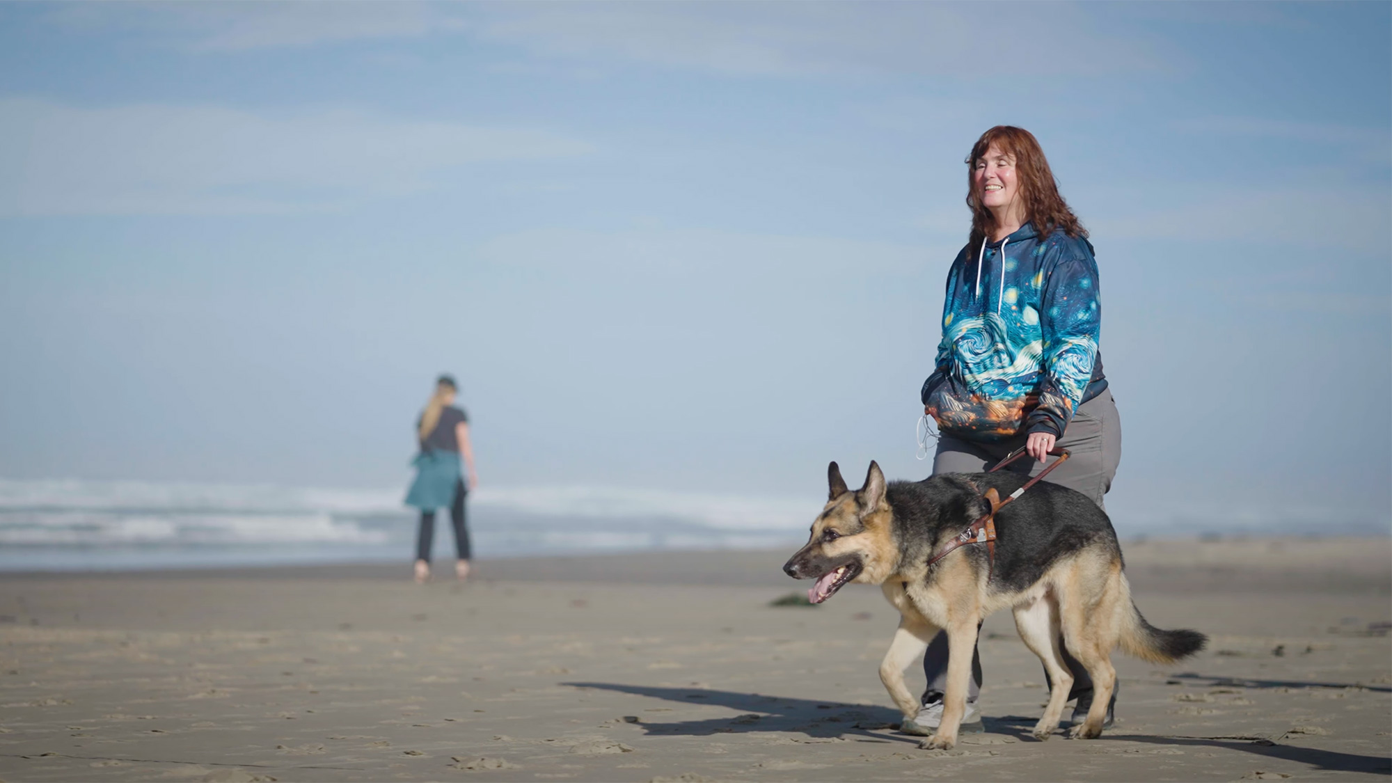 day beach service dog woman