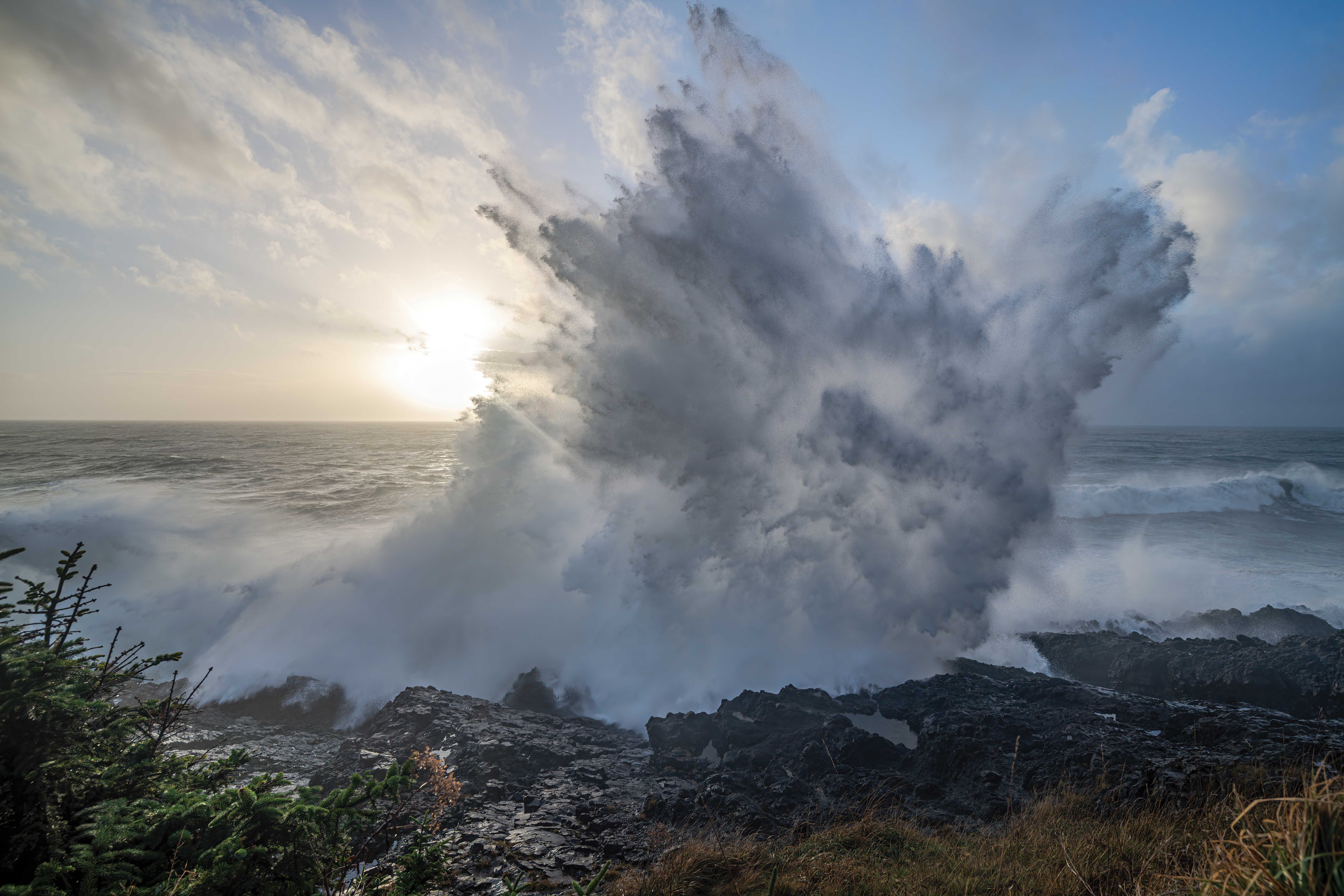 splash of wave hitting a rock shelf on the Oregon Coast