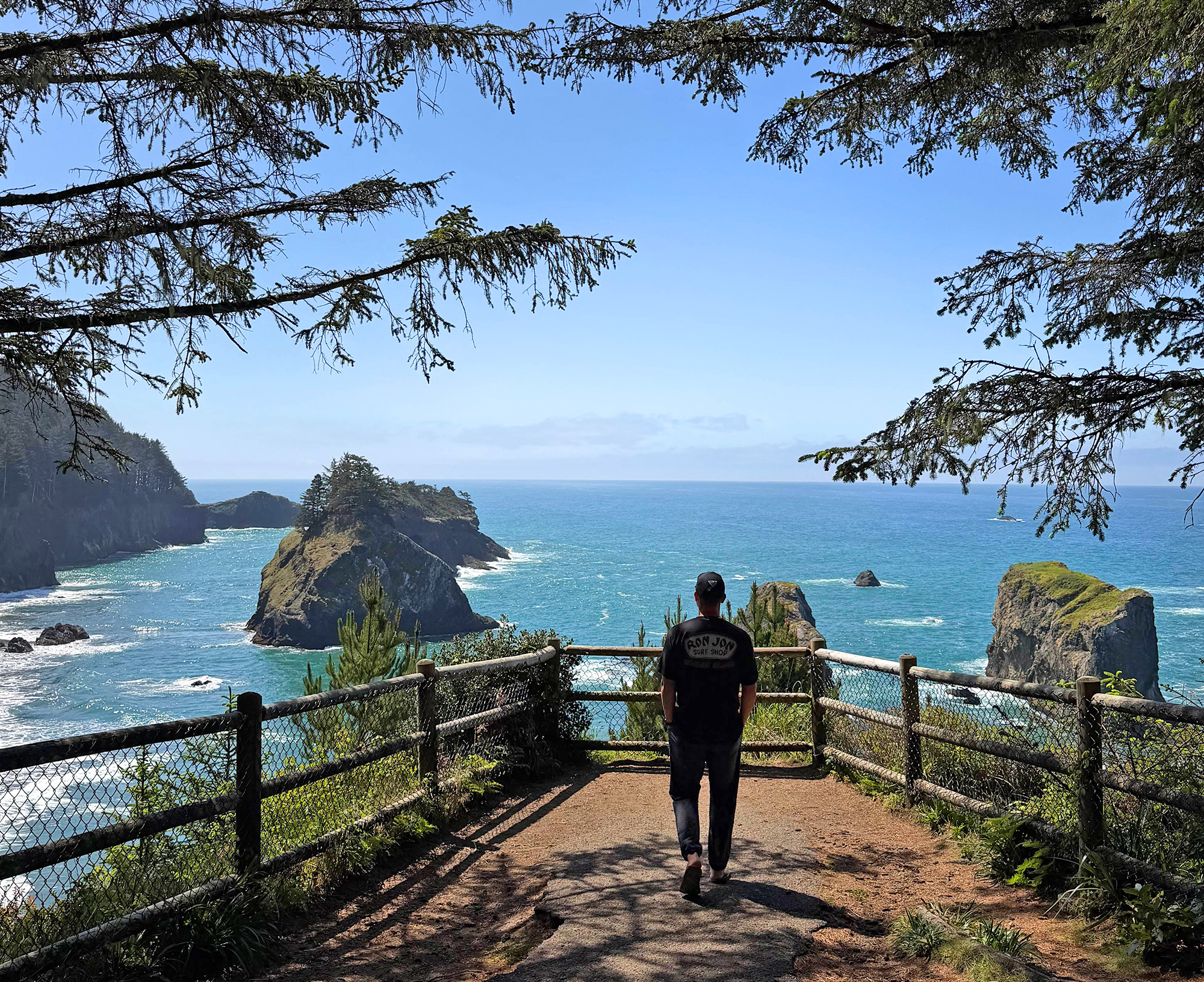 Arch Rock Viewpoint hiker ocean sea stacks
